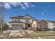 Two-story house with attached garage and landscaping at 2272 Front Range Rd, Erie, CO 80516