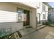 Back door entrance to the property, with a security door and access to the backyard at 7900 W Layton Ave # 833, Littleton, CO 80123