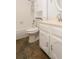 Clean bathroom with white vanity, shower, and toilet at 7900 W Layton Ave # 833, Littleton, CO 80123