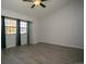 Large bedroom with wood-look floors and plenty of window light at 7900 W Layton Ave # 833, Littleton, CO 80123
