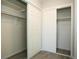 Spacious bedroom closets with double sliding doors and shelving at 7900 W Layton Ave # 833, Littleton, CO 80123