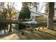 Peaceful pond with ducks and autumn foliage at 7900 W Layton Ave # 833, Littleton, CO 80123