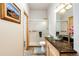 Bathroom with glass sink and walk-in shower at 39553 County Road 21, Elizabeth, CO 80107