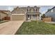 Two-story home with stone and siding exterior at 5363 E Weston Ave, Castle Rock, CO 80104