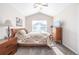 Main bedroom with a queen bed and vaulted ceiling at 1851 S Buchanan Cir, Aurora, CO 80018