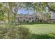 Three-story townhouses with balconies and a lush lawn at 9448 E Florida Ave # 1078, Denver, CO 80247