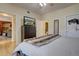 Spacious bedroom with large dresser and en-suite bathroom access at 9448 E Florida Ave # 1078, Denver, CO 80247