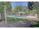 Community swimming pool with surrounding fenced area at 9448 E Florida Ave # 1078, Denver, CO 80247