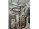 Well maintained mechanical room with furnace and water heater at 9448 E Florida Ave # 1078, Denver, CO 80247