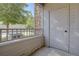 Private patio with storage closet and view of landscaping at 9448 E Florida Ave # 1078, Denver, CO 80247