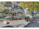 Landscaped grounds with a fenced-in area and pathways at 9448 E Florida Ave # 1078, Denver, CO 80247