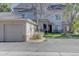 Two-story townhome with attached garage and reserved parking at 9448 E Florida Ave # 1078, Denver, CO 80247