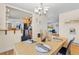 Elegant dining room with hardwood floors and kitchen access at 530 Dover St, Lakewood, CO 80226