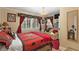 Cozy bedroom with a comfortable bed and western-themed decor at 27425 Spruce Ln, Evergreen, CO 80439