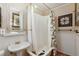 Clean bathroom with a classic clawfoot tub and shower at 27425 Spruce Ln, Evergreen, CO 80439