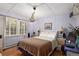 Serene bedroom with a double bed and light lavender walls at 27425 Spruce Ln, Evergreen, CO 80439