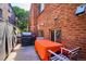 Small patio with a table, chairs, and a grill at 1421 N Pearl St # 2, Denver, CO 80203