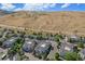 Aerial image showing the community and surrounding landscape at 1646 S Deframe St # A1, Lakewood, CO 80228