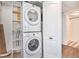 Laundry room with washer, dryer and shelving at 1646 S Deframe St # A1, Lakewood, CO 80228