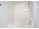 Bathroom with bathtub and tiled shower at 1646 S Deframe St # A1, Lakewood, CO 80228