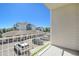 Apartment balcony overlooking the parking lot and surrounding buildings at 15700 E Jamison Dr # 8-203, Englewood, CO 80112