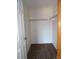 Large closet with wood shelving and carpet at 12043 W Cross Dr # 201, Littleton, CO 80127