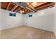 Unfinished basement area with exposed ceiling beams at 8224 E Kenyon Dr, Denver, CO 80237