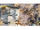 Aerial view showing house and surrounding trees at 1151 S Nome St, Aurora, CO 80012