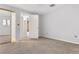 Bedroom with mirrored closet and access to bathroom at 1151 S Nome St, Aurora, CO 80012