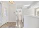Bright entryway with tile flooring, leading to hallway with access to other rooms at 1151 S Nome St, Aurora, CO 80012