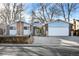 House exterior with double garage and landscaping at 1151 S Nome St, Aurora, CO 80012