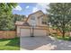 Two-story house with a three-car garage and basketball hoop at 18872 E Prentice Pl, Centennial, CO 80015