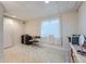 Spacious basement room with window and tiled floor at 18872 E Prentice Pl, Centennial, CO 80015