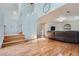 Bright living room with hardwood floors and access to the kitchen at 18872 E Prentice Pl, Centennial, CO 80015
