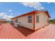 Large deck wraps around the home, offering ample outdoor space at 12155 Mesa View Rd, Larkspur, CO 80118
