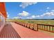 Long deck provides plenty of space for seating and enjoying the view at 12155 Mesa View Rd, Larkspur, CO 80118