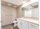 Simple bathroom with toilet, vanity, and shower at 12983 W Ida Ave # 107 Ada Type A, Littleton, CO 80127