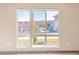 Scenic view from large windows overlooking neighborhood and mountains at 12983 W Ida Ave # 107 Ada Type A, Littleton, CO 80127