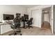 Home office with two workstations and ample natural light at 15195 E 16Th Pl # 204, Aurora, CO 80011