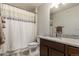 Clean bathroom with granite vanity and shower/tub combo at 15195 E 16Th Pl # 204, Aurora, CO 80011