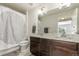 Double vanity bathroom with granite countertop and shower/tub combo at 15195 E 16Th Pl # 204, Aurora, CO 80011