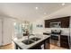 Eat-in kitchen with granite island, stainless steel appliances, and breakfast nook at 15195 E 16Th Pl # 204, Aurora, CO 80011
