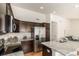 Modern kitchen with stainless steel appliances and granite countertops at 15195 E 16Th Pl # 204, Aurora, CO 80011