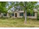 House exterior: Ranch style home with green shutters and a well-maintained lawn at 10272 Macedonia St, Longmont, CO 80503