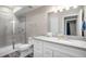Basement bathroom with shower, toilet, and granite vanity at 1170 Mcmurdo Cir, Castle Rock, CO 80108