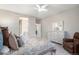 Charming bedroom with a queen bed and en-suite bathroom access at 1170 Mcmurdo Cir, Castle Rock, CO 80108