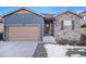 House exterior with stone and siding at 1170 Mcmurdo Cir, Castle Rock, CO 80108