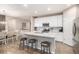Modern kitchen with stainless steel appliances and an island at 1170 Mcmurdo Cir, Castle Rock, CO 80108