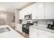 Modern kitchen with stainless steel appliances and granite countertops at 1170 Mcmurdo Cir, Castle Rock, CO 80108