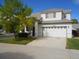 Two-story home with attached two-car garage at 19583 E Hollow Creek Dr, Parker, CO 80134